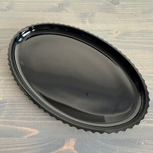 LE Smith vintage black glass table wear
Oval dish 7.75” x .75